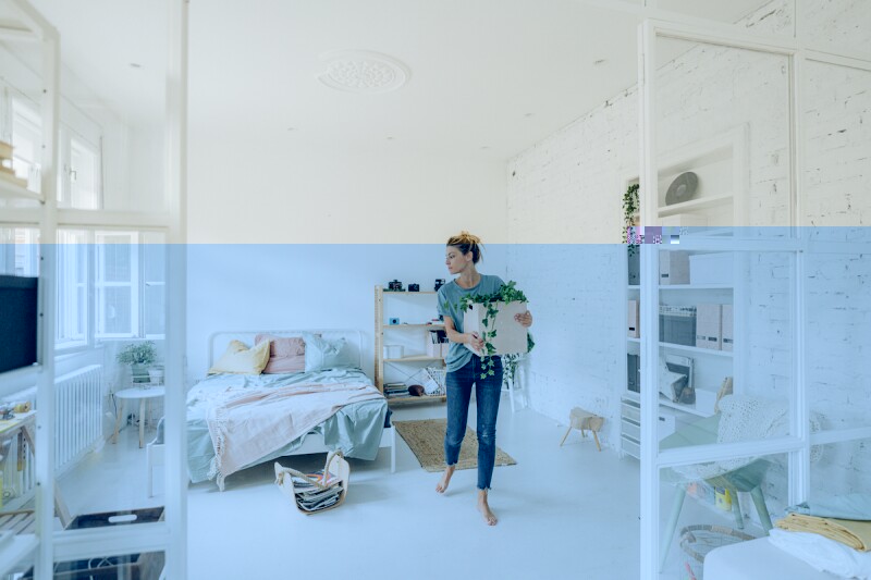 Girl moving into a new bedroom after graduating college