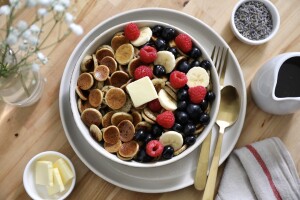 Bowl of pancake cereal with lavender maple syrup